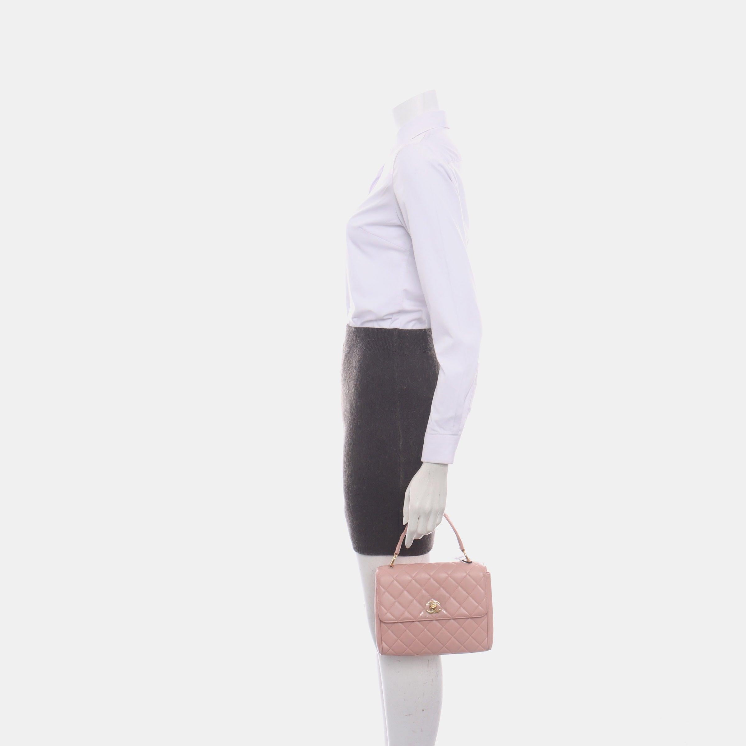 Chanel Vintage Top Handle Trendy CC Kelly Flap Bag Pink Cannage Lambskin Leather 24k Gold Plated Hardware

  Immerse yourself in the unparalleled luxury of supple caviar leather, flawlessly sculpted into the timeless Kelly boxy shape. A coveted