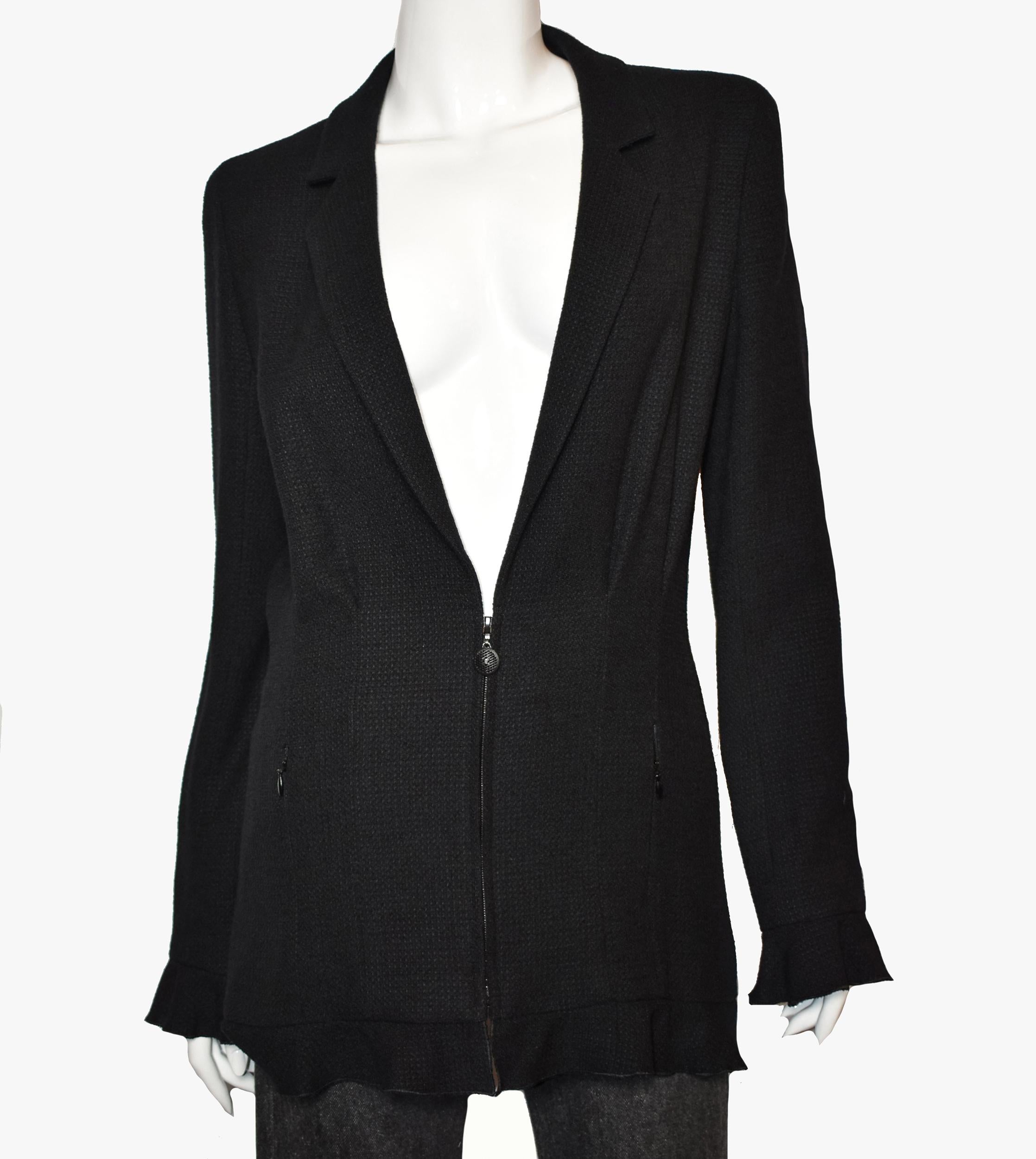 Chanel Frill Blazer From the Spring 2002 Collection by Karl Lagerfeld. Black color, tweed pattern, pointed collar, zip pockets & zip closure

Fabric: 60% Wool, 40% Rayon;  Lining 95% Silk, 5% Lycra;  Combo 90% Silk, 10% Elastane
Size: M / US6,