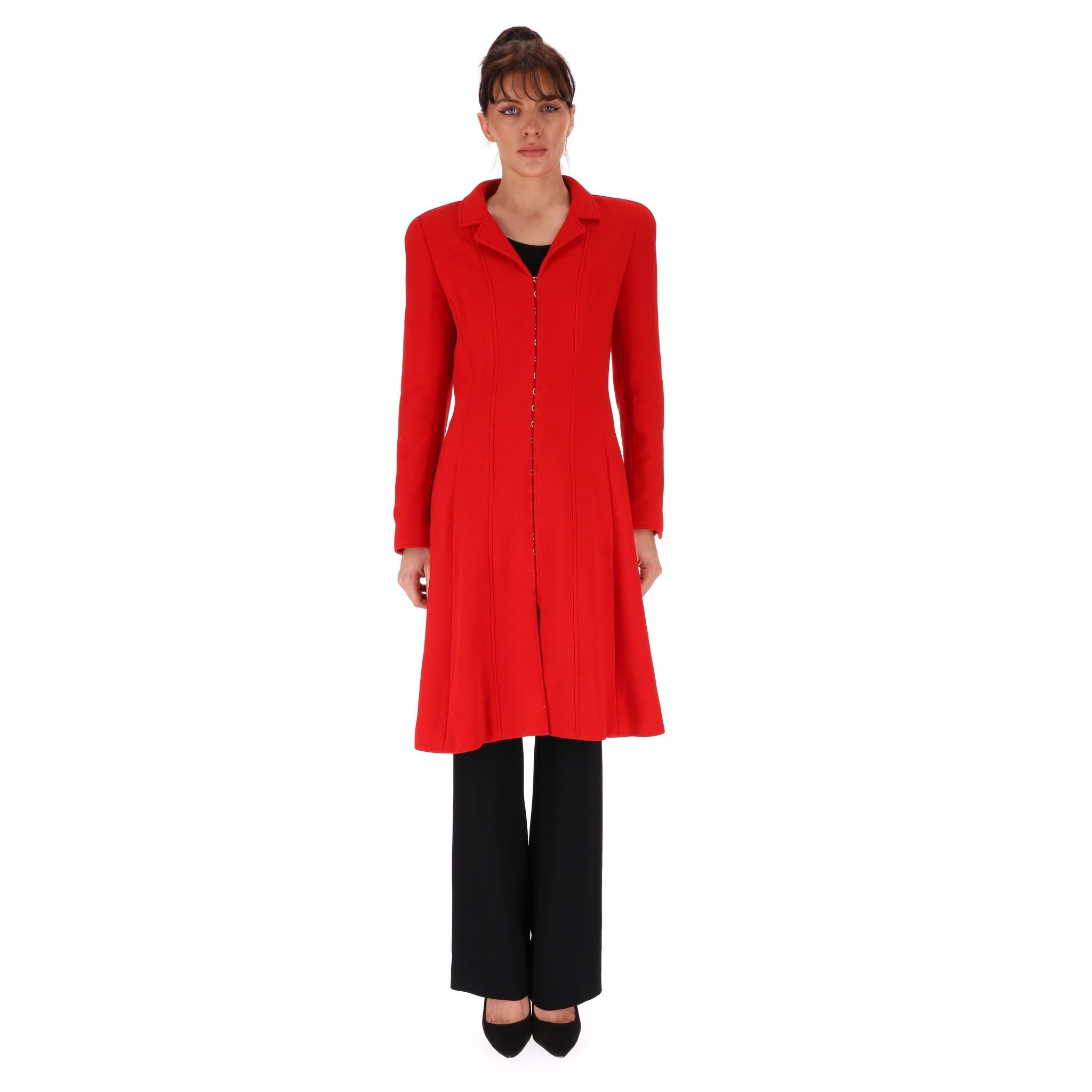 Chanel Vintage Virgin Wool Coat

From Fall 1996 Couture collection is this bright red coat fully crafted from virgin wool.

Flattering A-line silhouette, detailed with 'CC' logo engraved brushed gold buttoned cuffs and 'Chanel' engraved hook and eye