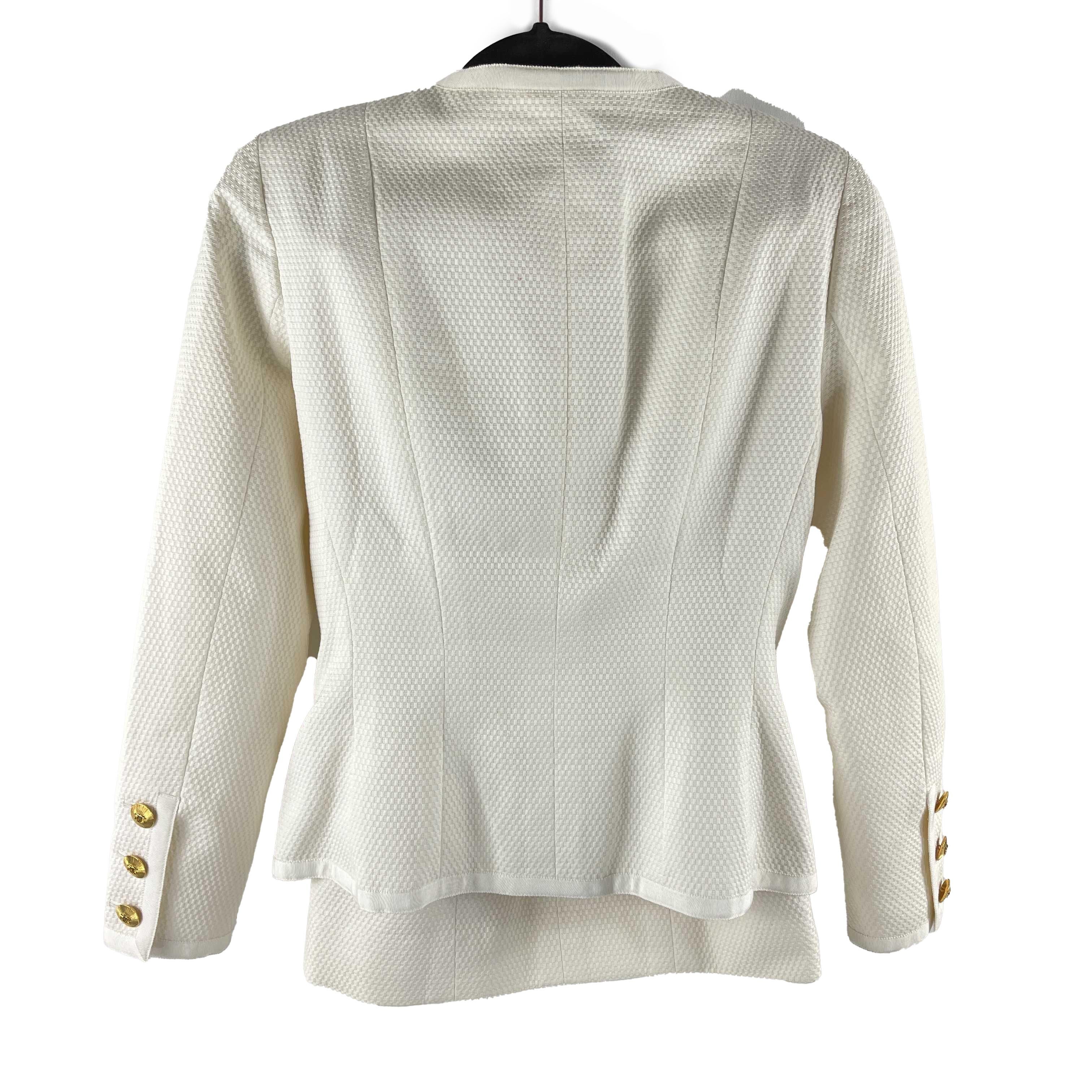 CHANEL - Very Good - Vintage Collection 27 Suit Jacket and Skirt - White, Gold-Toned Hardware - Jacket and Skirt: 38, US-6 - Set

Description

This vintage Chanel jacket and skirt suit set is from Collection 27 and was released sometime between