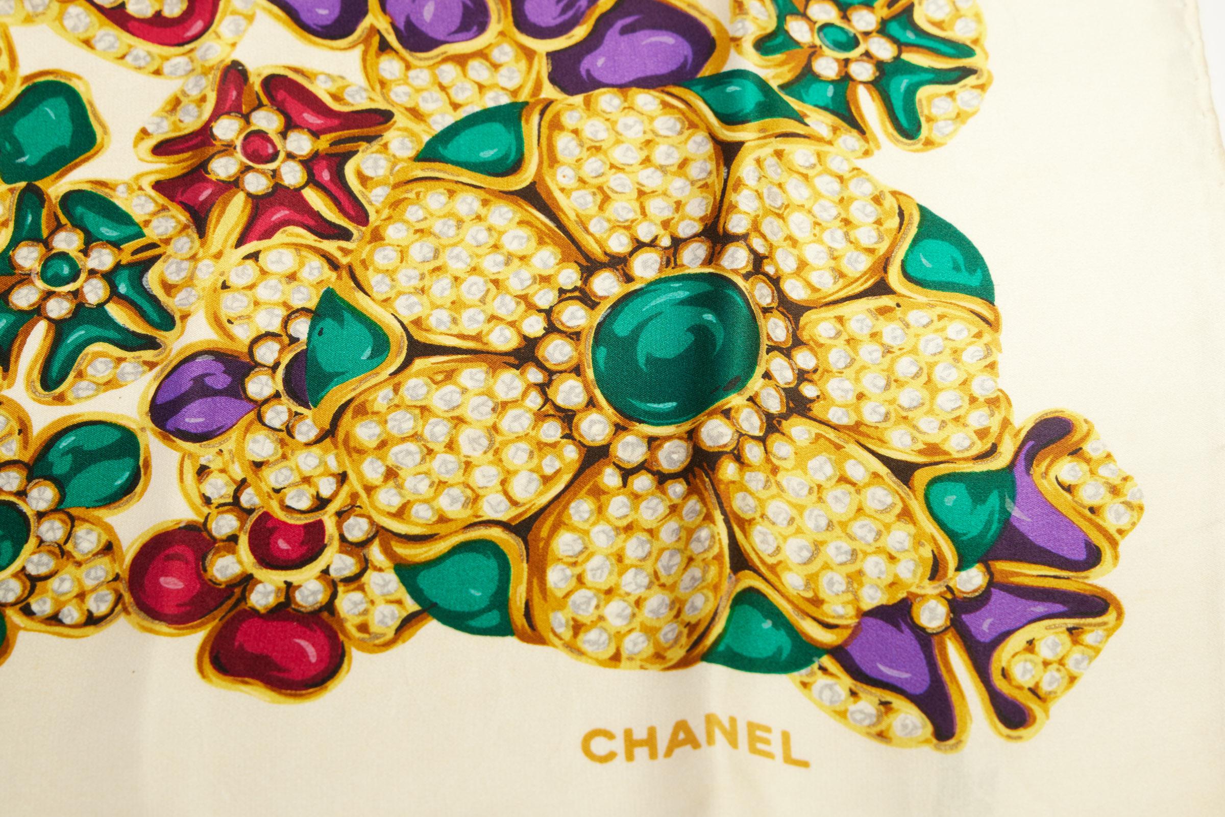 Chanel off white vintage silk scarf with gripoix jewelry design. Minor darkening in the center, please refer to photos. Original care tag.