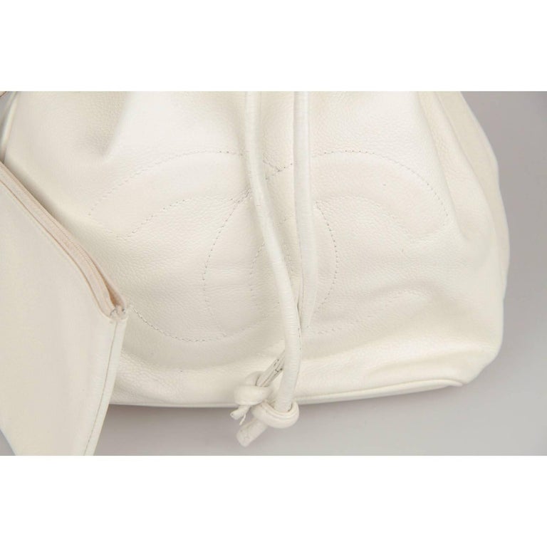 CHANEL Vintage White Leather DRAWSTRING BAG with CC LOGO For Sale at  1stDibs  chanel white drawstring bag, chanel drawstring bag white, chanel  white bucket bag