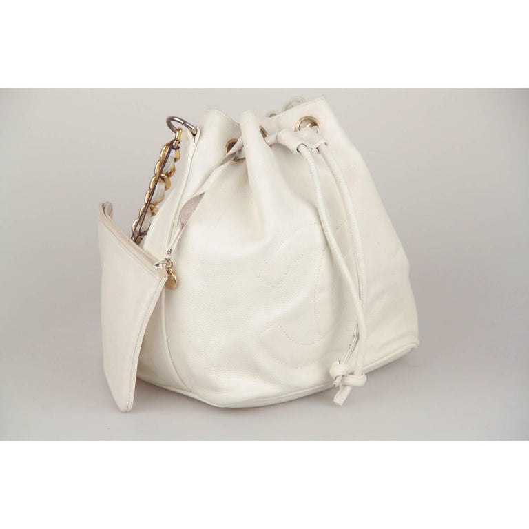 CHANEL Vintage White Leather DRAWSTRING BAG with CC LOGO For Sale at  1stDibs  chanel white drawstring bag, chanel drawstring bag white, chanel  white bucket bag