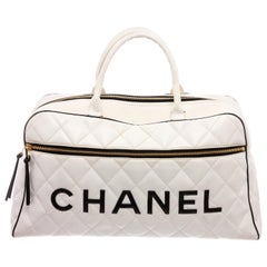 Chanel Retro White Quilted Leather Black Logo Duffle Bag