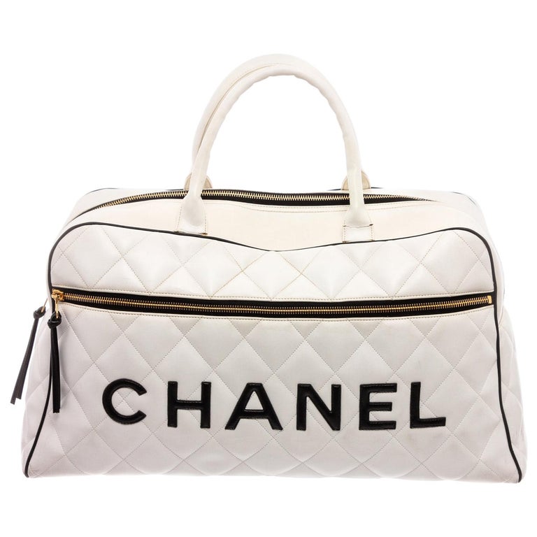 Chanel Vintage White Quilted Leather Black Logo Duffle Bag