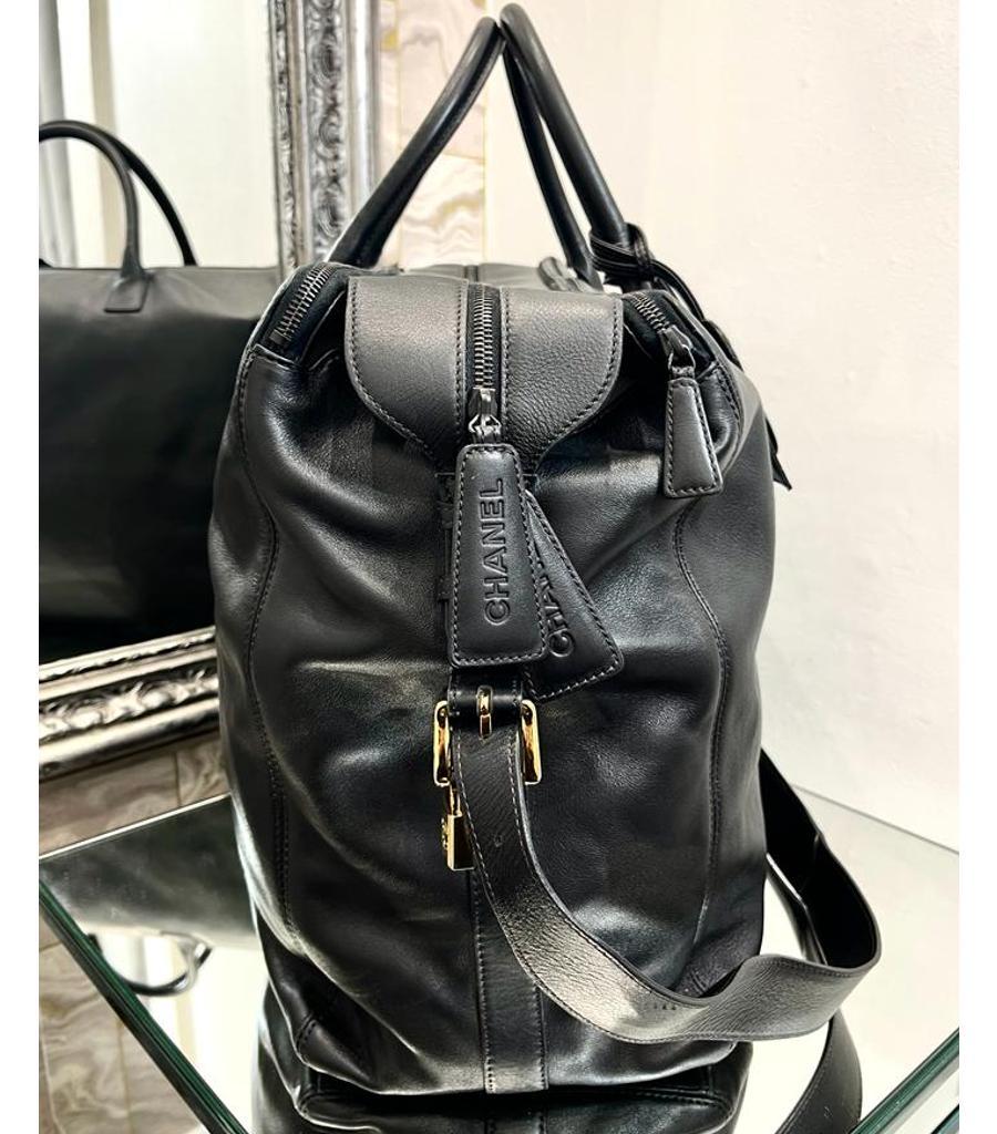 Black Chanel Vintage X/L Leather Travel Bag With Gold 'CC' Padlock