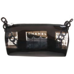 Used Chanel vinyl baguette with a black and transparent window graphic print