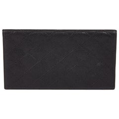 CHANEL Wallet in Black Quilted Caviar Leather