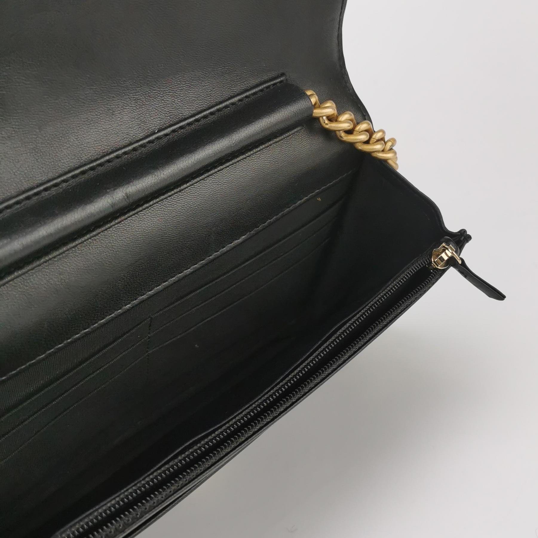 Chanel Wallet on Chain Boy Flap Black Lambskin Leather Gold Hardware In Good Condition For Sale In AUBERVILLIERS, FR