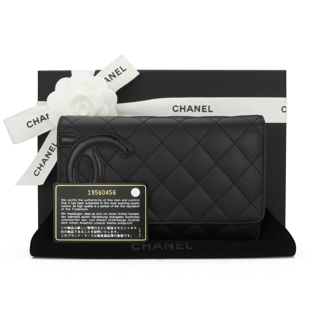 CHANEL Wallet On Chain Cambon Black Calfskin with Silver-Tone Hardware 2014.

This stunning wallet on chain is in very good condition, it still holds its original shape, and the hardware is still very shiny.

- Exterior Condition: Very good