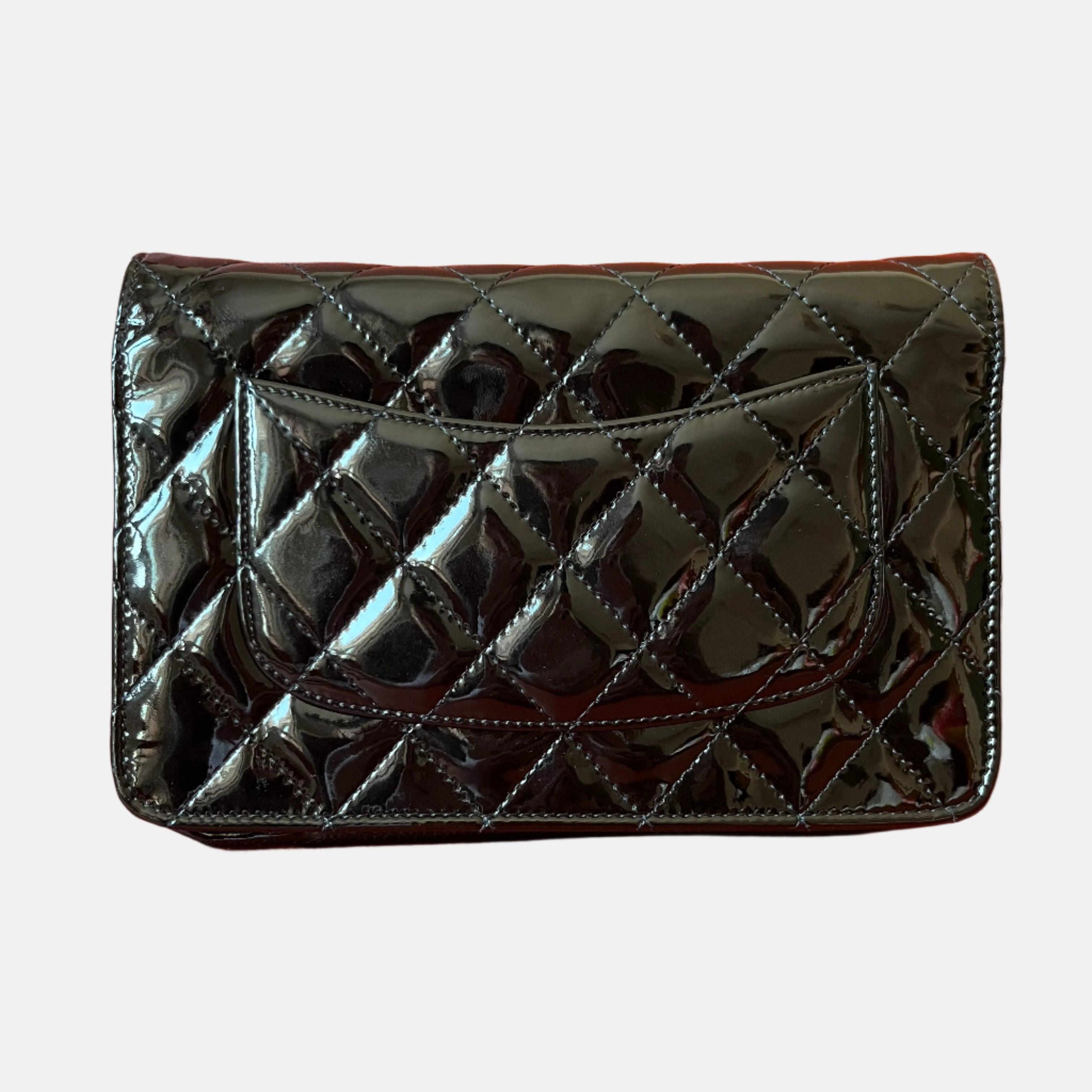 Chanel Wallet on Chain Classic Flap Black Patent Leather
 These are professional photos of the actual bag .
  
 Perfect for any occasion, the Chanel Wallet on Chain WOC is crafted from patent leather in black color with silver-ton hardware. It