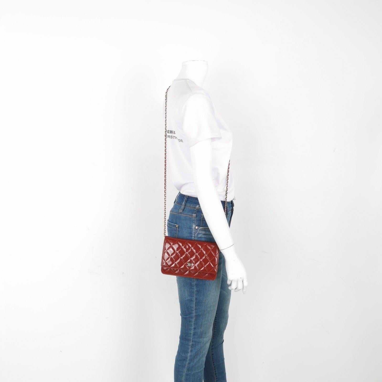 Chanel Wallet on Chain Classic Flap Red Patent Leather These are professional photos of the actual bag offered by Luxbags. Perfect for any occasion, the Chanel Wallet on Chain WOC is crafted from patent leather in coral pink color with silver-ton