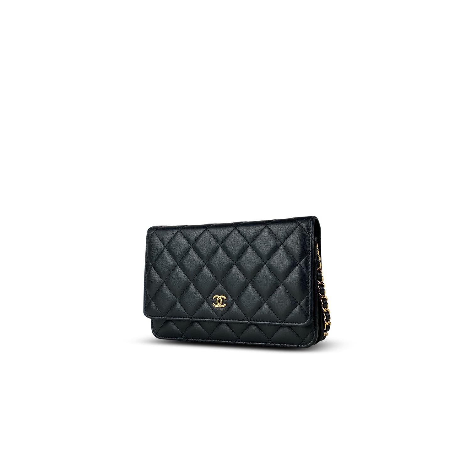 Black quilted lambskin leather Chanel Wallet On Chain with

- Gold-tone hardware
- Single chain-link and leather shoulder strap
- CC logo adornment at front flap, single patch pocket at back, single zip pocket at flap underside
- Single slit pocket