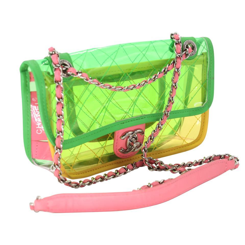 Ok ladies here is an extremely rare Runway Chanel master piece.  This style was showcased in 2018 Chanel fashion show with bright neon colors green & pink super chic and a total statement piece. Bag includes a beautiful leather threaded shoulder