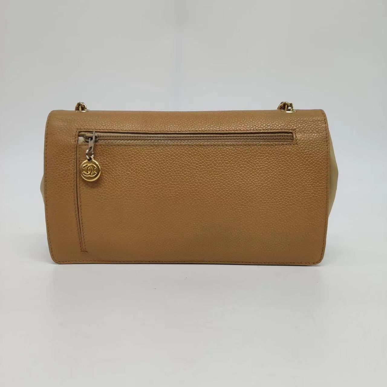 Chanel Wallet on Chain Vintage Flap Bag Double CC Camel Caviar Leather
 These are professional photos of the actual bag offered by Luxbags.
 
 Perfect for any occasion, the Chanel Wallet on Chain WOC is crafted from luxurious and scratch-resistant