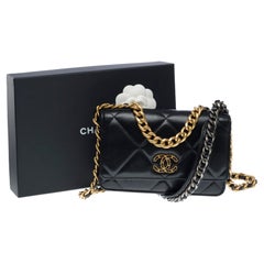 Chanel Wallet on Chain (WOC) 19 shoulder bag in black lambskin quilted leather