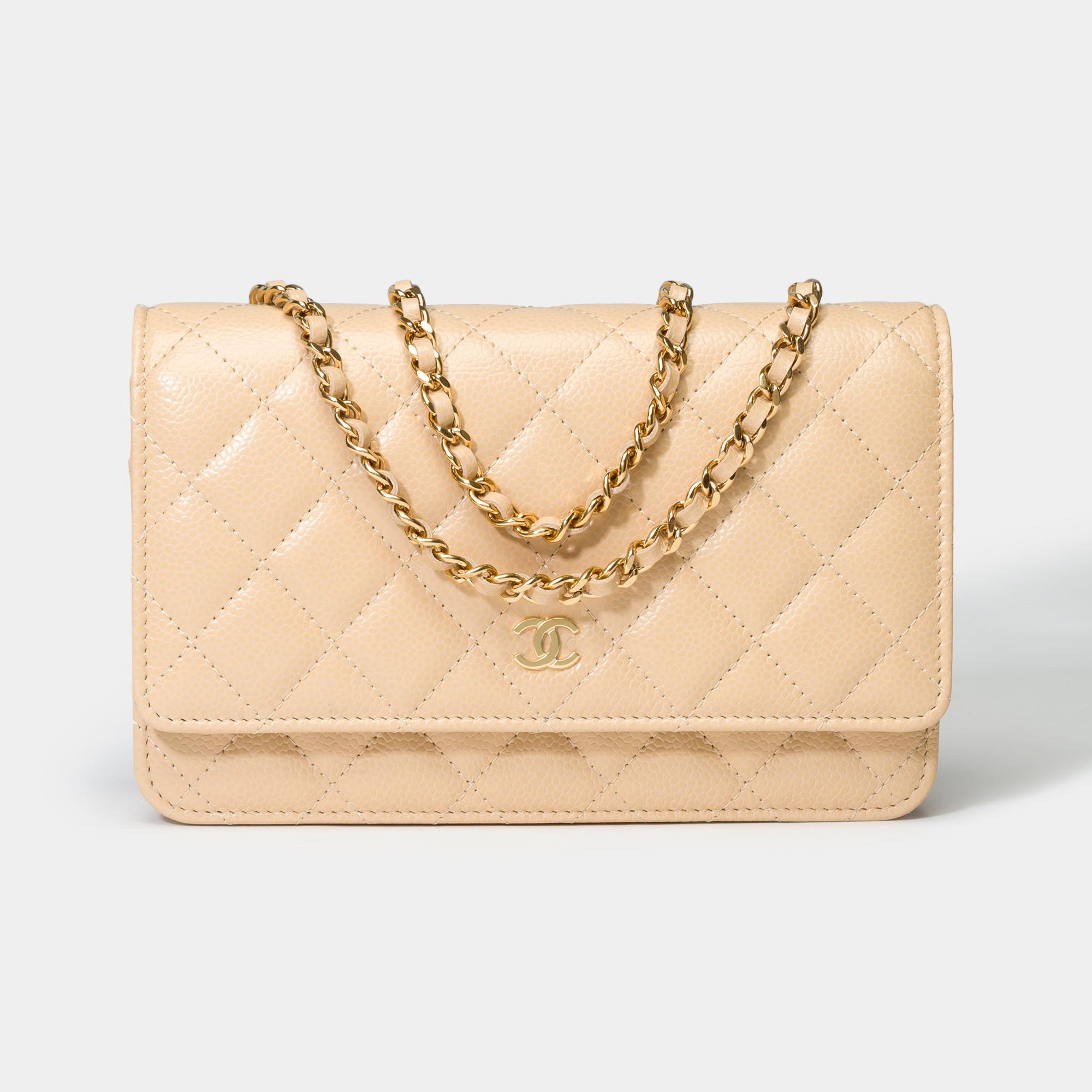 Superb​ ​Chanel​ ​Wallet​ ​On​ ​Chain​ ​(WOC)​ ​bag​ ​in​ ​beige​ ​quilted​ ​caviar​ ​leather,​ ​gold​ ​metal​ ​trim,​ ​a​ ​gold​ ​metal​ ​chain​ ​handle​ ​interlaced​ ​with​ ​beige​ ​leather​ ​for​ ​shoulder​ ​or​ ​crossbody​ ​carry


Closure​ ​by​