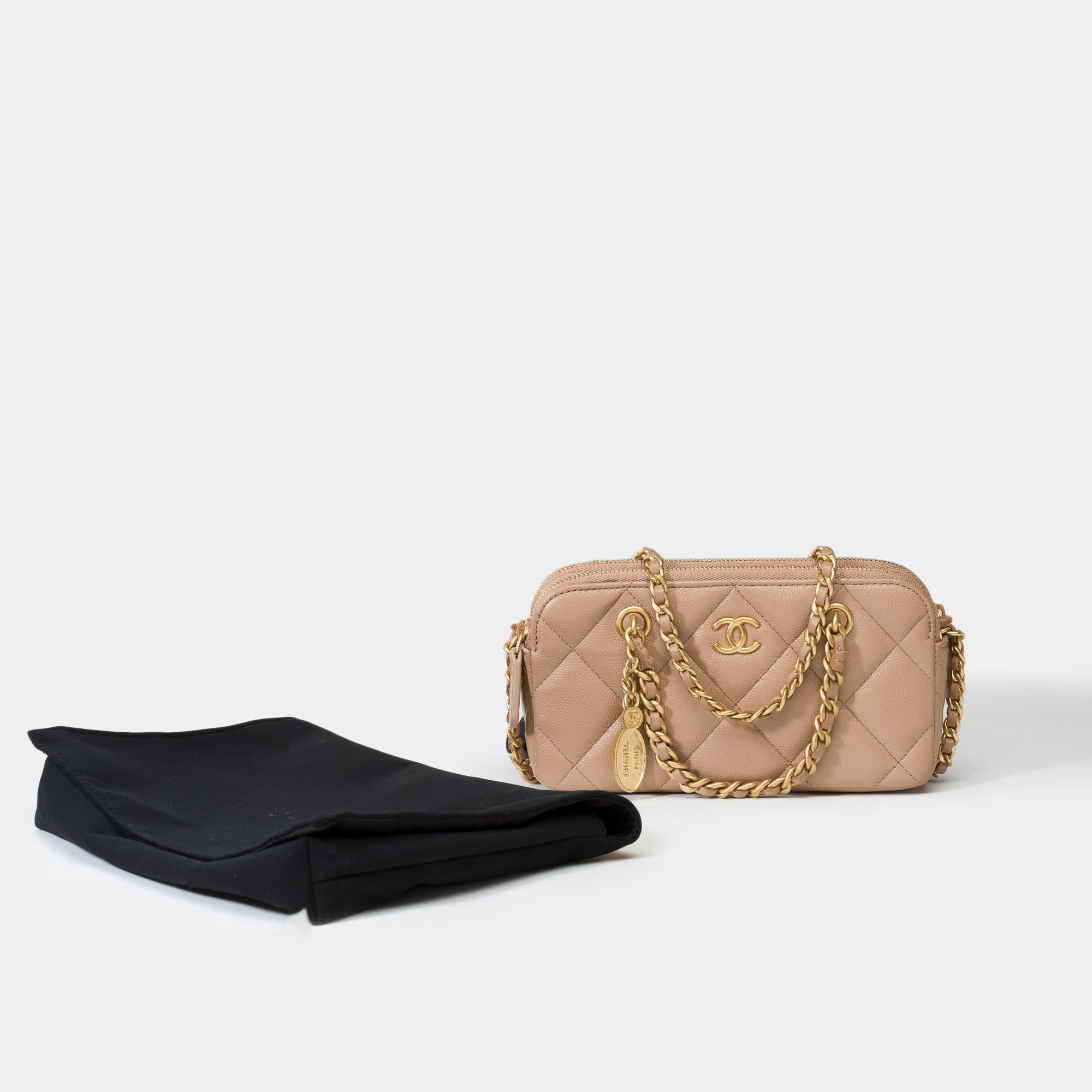 Gorgeous​ ​Chanel​ ​Wallet​ ​On​ ​Chain​ ​Shoulder​ ​Bag​ ​(WOC)​ ​in​ ​beige​ ​quilted​ ​caviar​ ​leather​ ​with​ ​matte​ ​gold​ ​metal​ ​trim,​ ​a​ ​matte​ ​gold​ ​metal​ ​chain​ ​interlaced​ ​with​ ​beige​ ​leather​ ​for​ ​shoulder​ ​or​