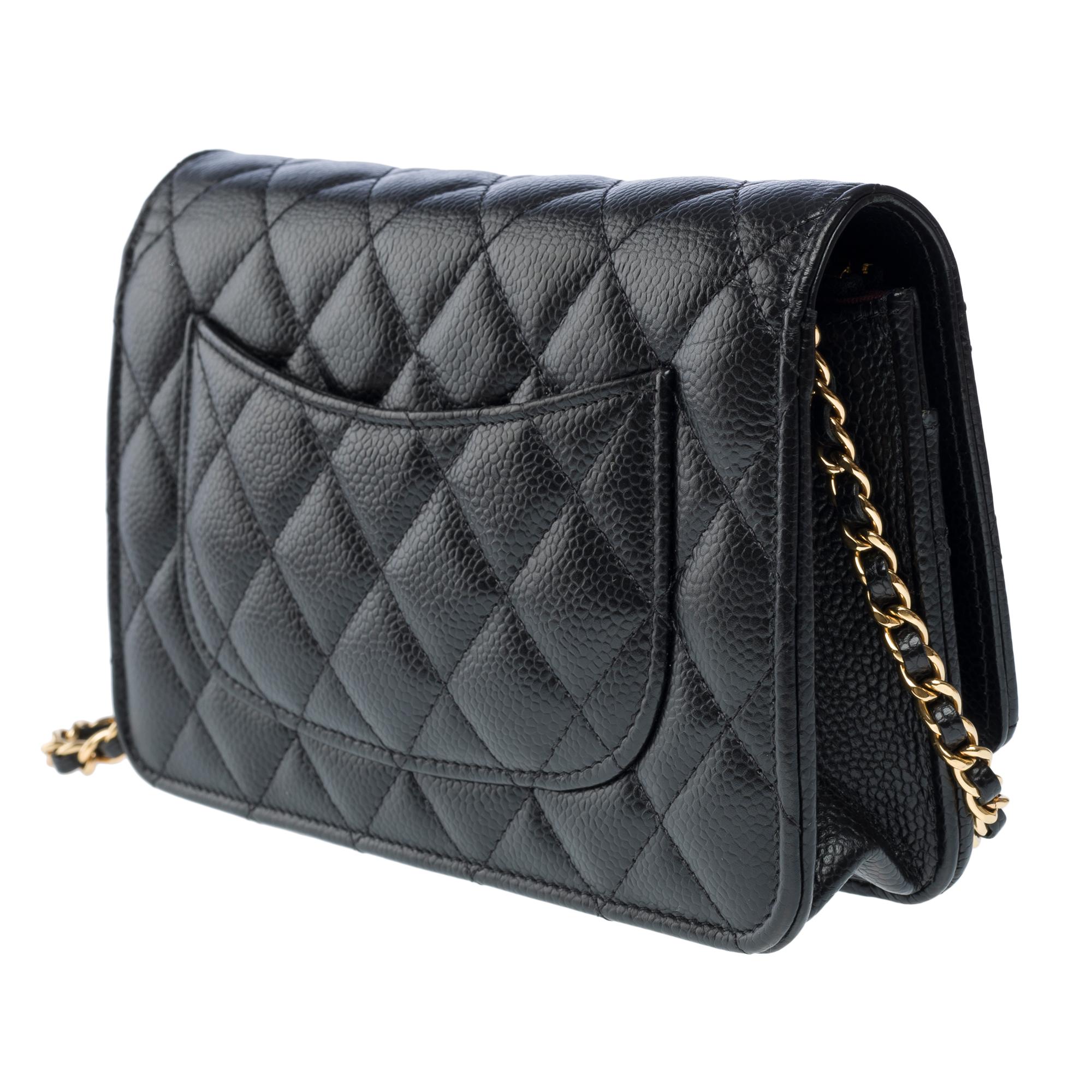 Chanel Wallet on Chain (WOC)  shoulder bag in black Caviar quilted leather, GHW For Sale 1
