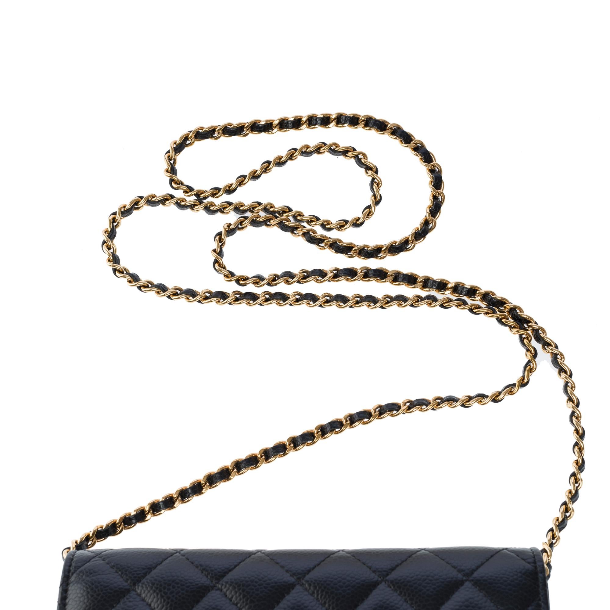 Chanel Wallet on Chain (WOC)  shoulder bag in black Caviar quilted leather, GHW For Sale 5