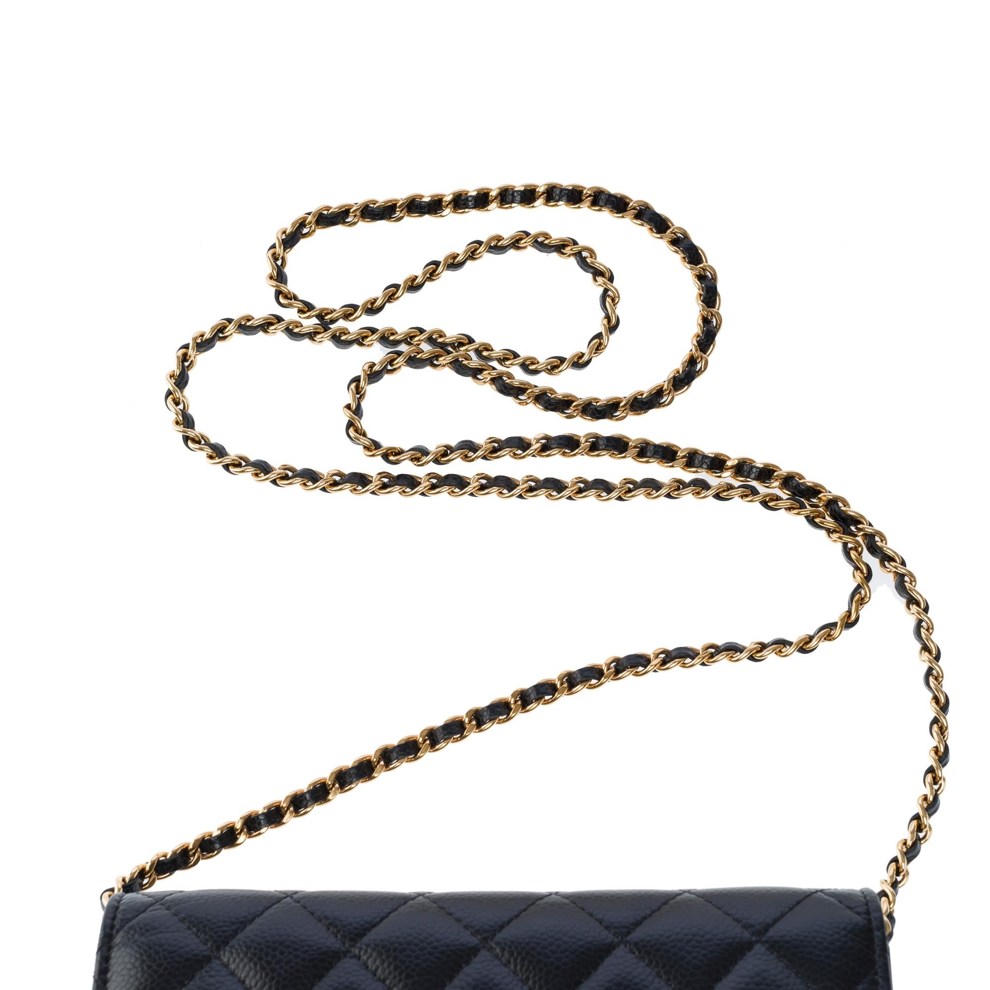 Chanel Wallet on Chain (WOC)  shoulder bag in black Caviar quilted leather, GHW For Sale 4