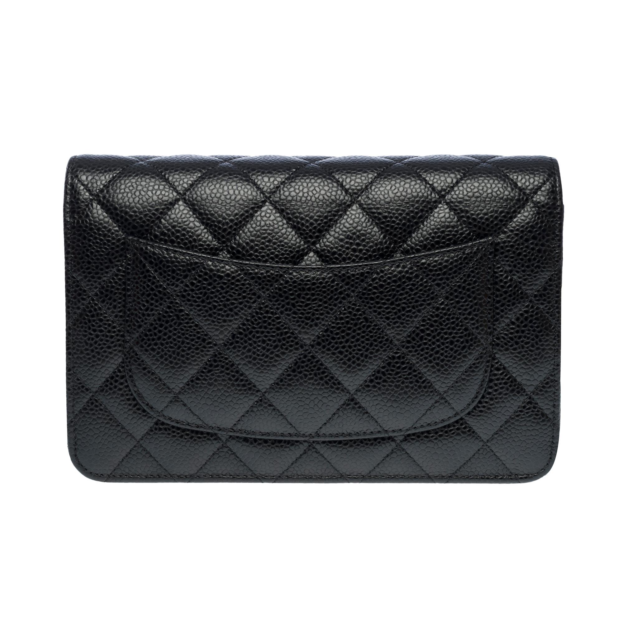 Chanel Wallet on Chain (WOC)  shoulder bag in black Caviar quilted leather, SHW In Excellent Condition In Paris, IDF