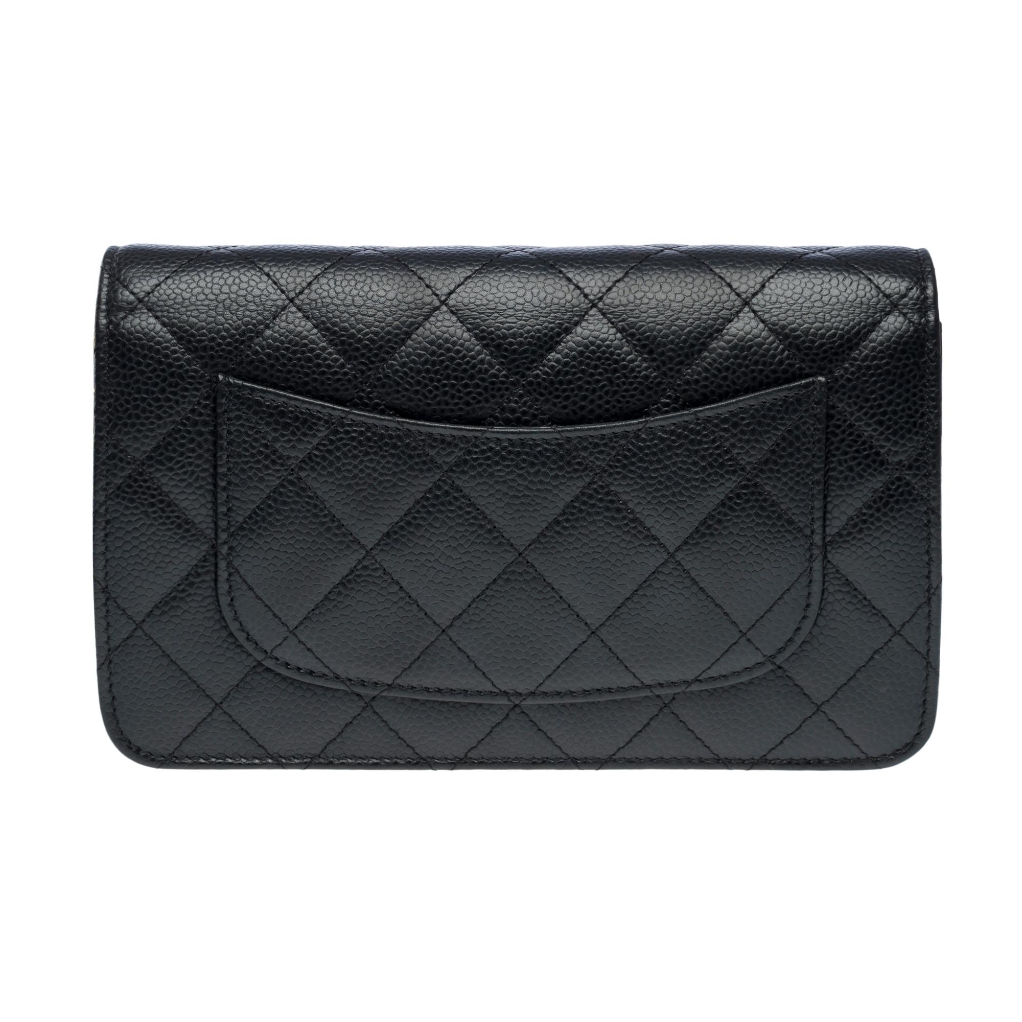 Women's Chanel Wallet on Chain (WOC)  shoulder bag in Black quilted Caviar leather, GHW For Sale
