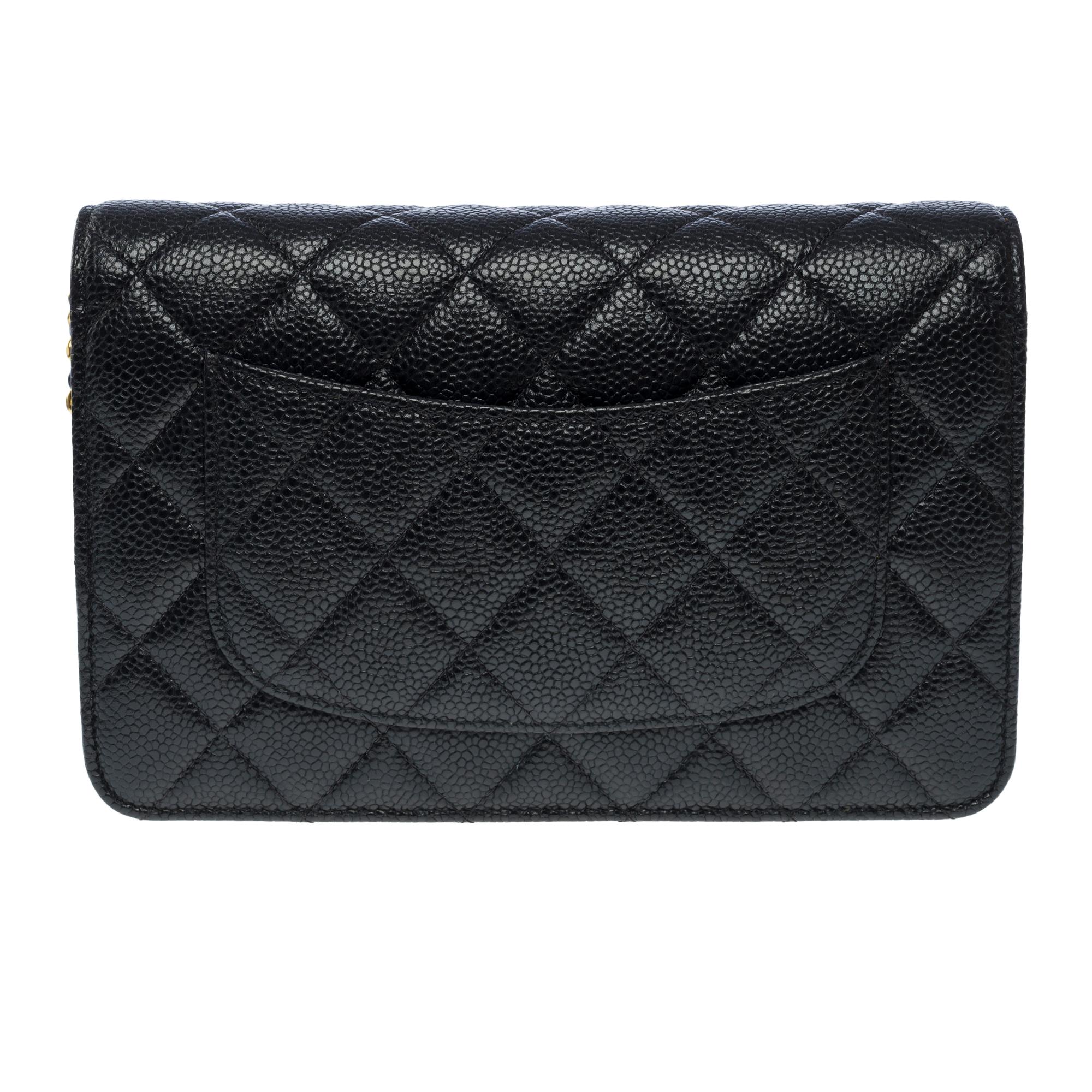 Women's Chanel Wallet on Chain (WOC)  shoulder bag in Black quilted Caviar leather, GHW For Sale