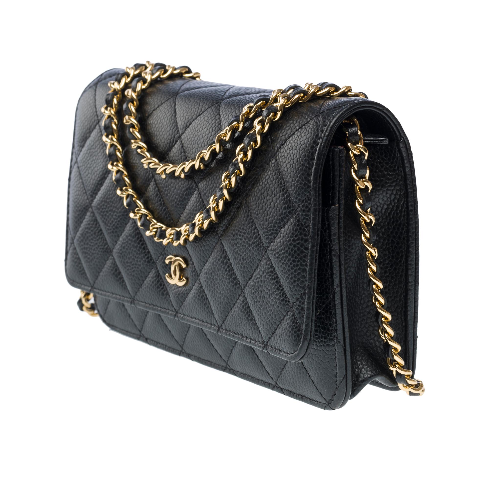 Chanel Wallet on Chain (WOC)  shoulder bag in Black quilted Caviar leather, GHW For Sale 1