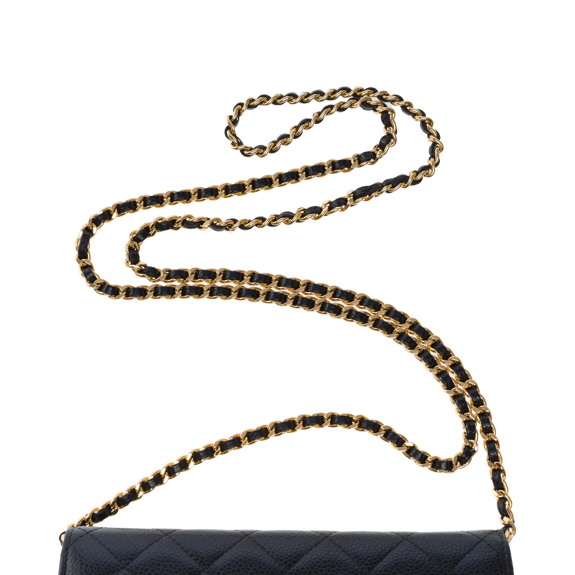 Chanel Wallet on Chain (WOC)  shoulder bag in Black quilted Caviar leather, GHW For Sale 5