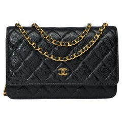 Vintage Chanel Wallet on Chain (WOC)  shoulder bag in Black quilted Caviar leather, GHW