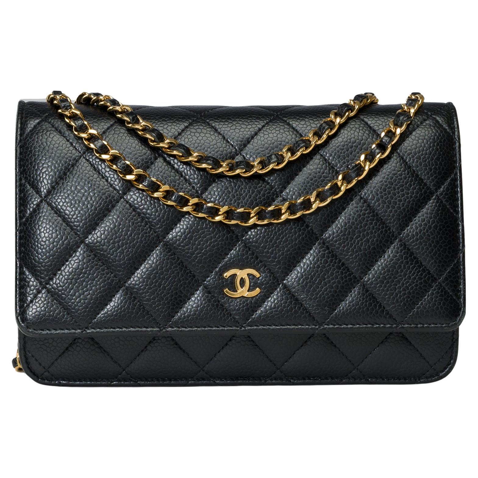 Chanel Wallet on Chain (WOC)  shoulder bag in Black quilted Caviar leather, GHW For Sale