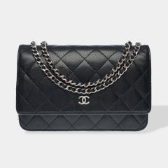 Chanel Wallet on Chain (WOC)  shoulder bag in Black quilted Caviar leather, PHW