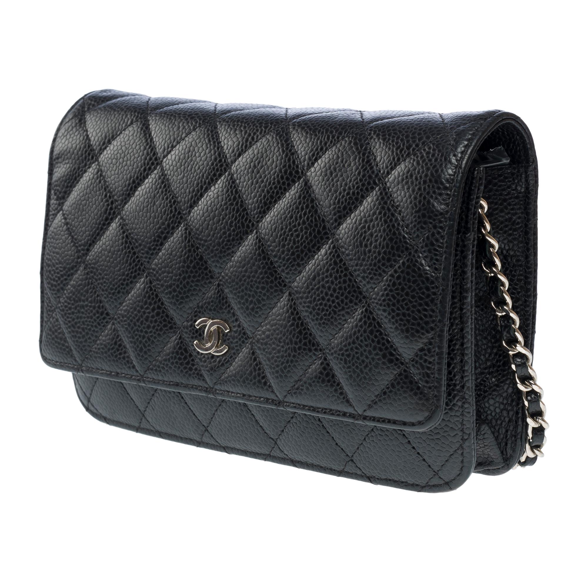 Women's Chanel Wallet on Chain (WOC)  shoulder bag in Black quilted Caviar leather, SHW