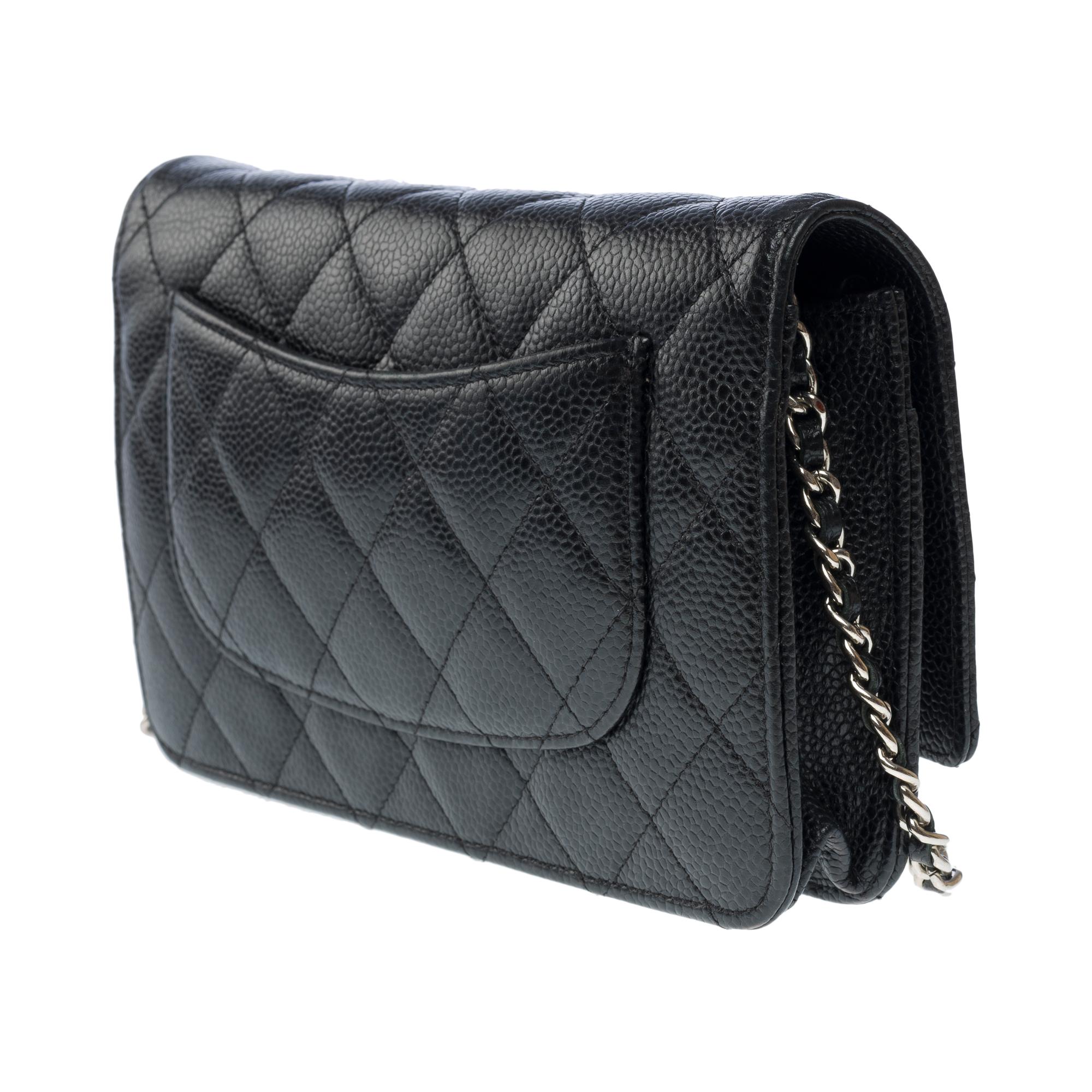 Chanel Wallet on Chain (WOC)  shoulder bag in Black quilted Caviar leather, SHW 1
