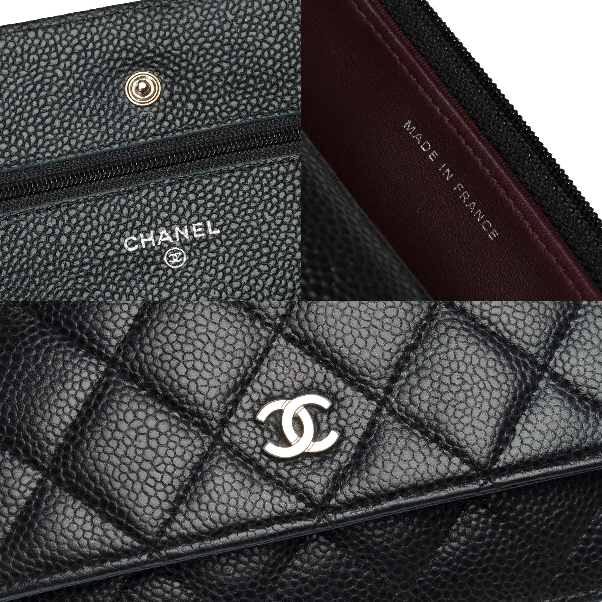 Cartera Chanel con cadena (WOC)  Bolso bandolera en piel Caviar acolchada Negra, SHW 1