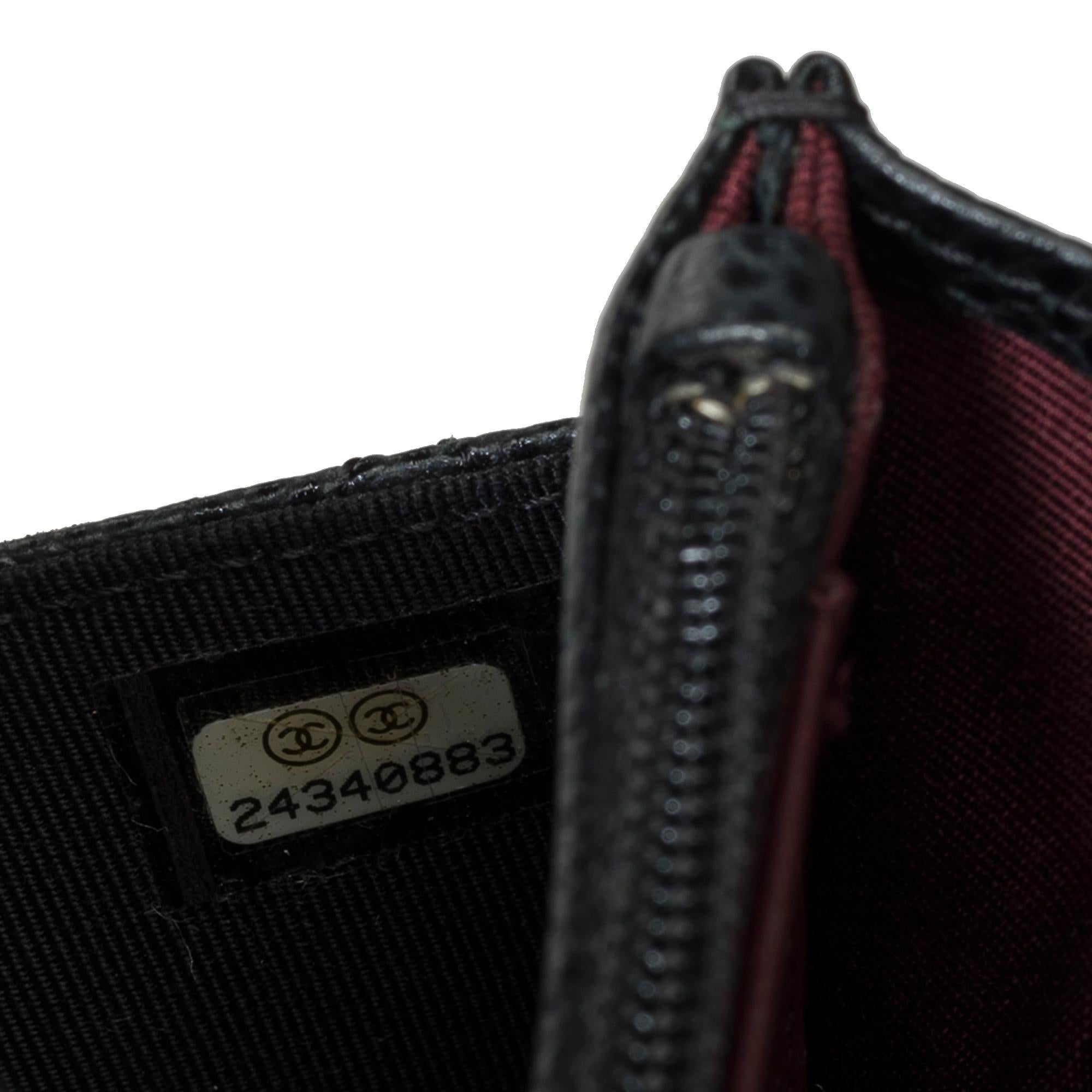 Cartera Chanel con cadena (WOC)  Bolso bandolera en piel Caviar acolchada Negra, SHW 2