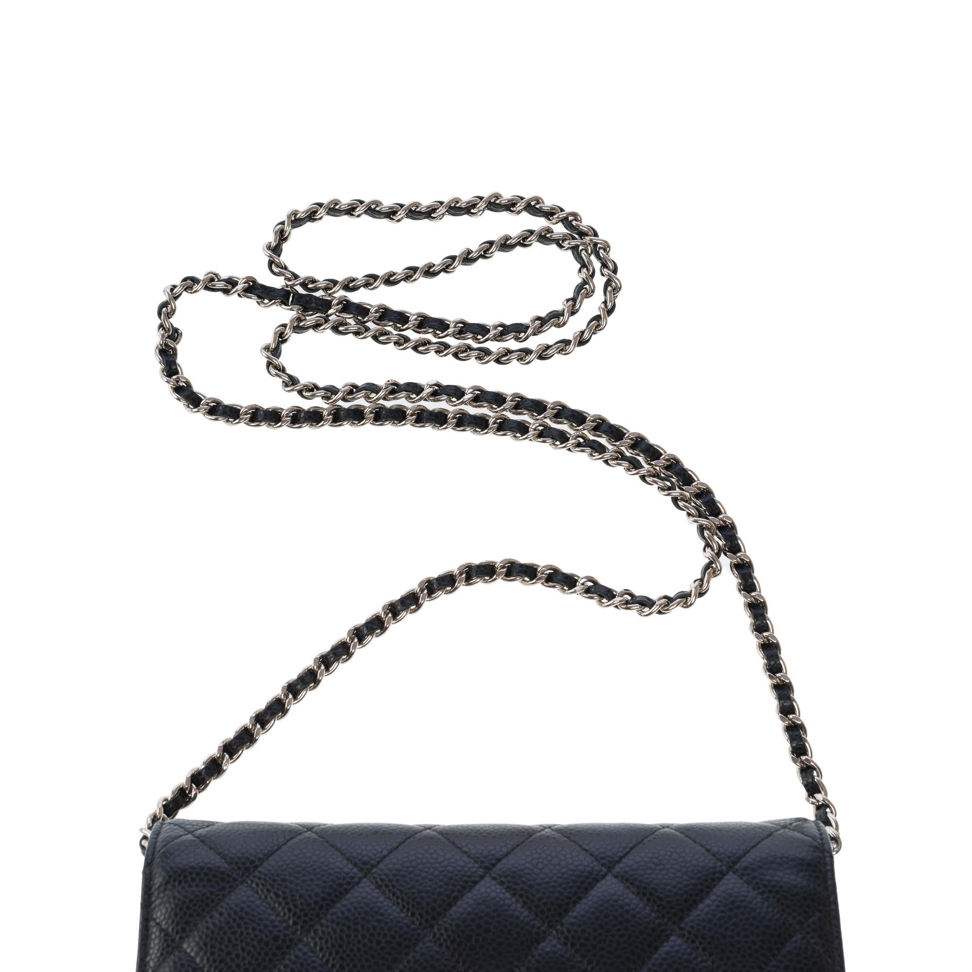 Chanel Wallet on Chain (WOC)  shoulder bag in Black quilted Caviar leather, SHW 5