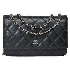 Chanel Wallet on Chain (WOC)  shoulder bag in Black quilted Caviar leather, SHW