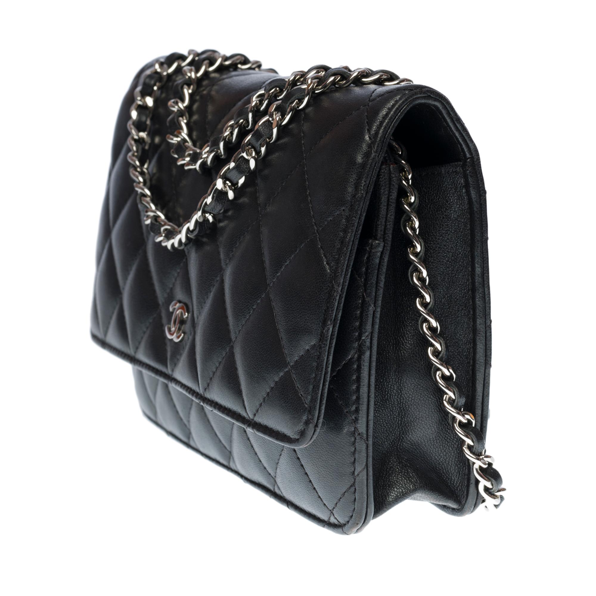 Black Chanel Wallet on Chain (WOC)  shoulder bag in black quilted leather, SHW