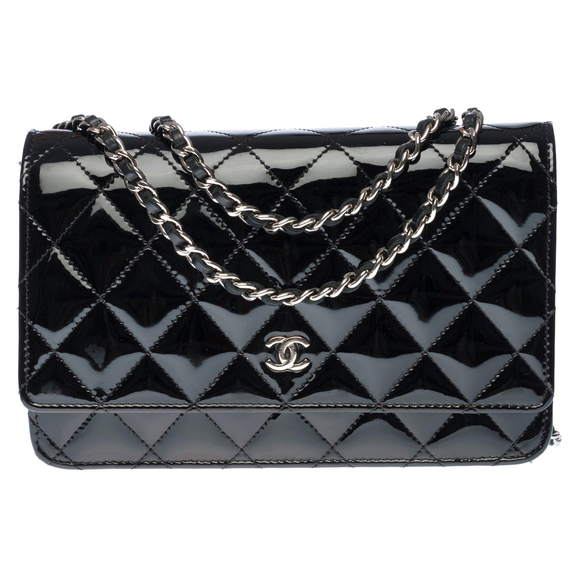 Chanel Wallet on Chain (WOC) shoulder bag in black quilted patent leather, SHW