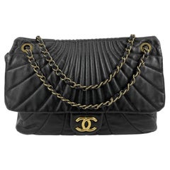 CHANEL Wave Quilted Black Calfskin Leather Maxi Flap Gold-tone Shoulder Bag  For Sale at 1stDibs