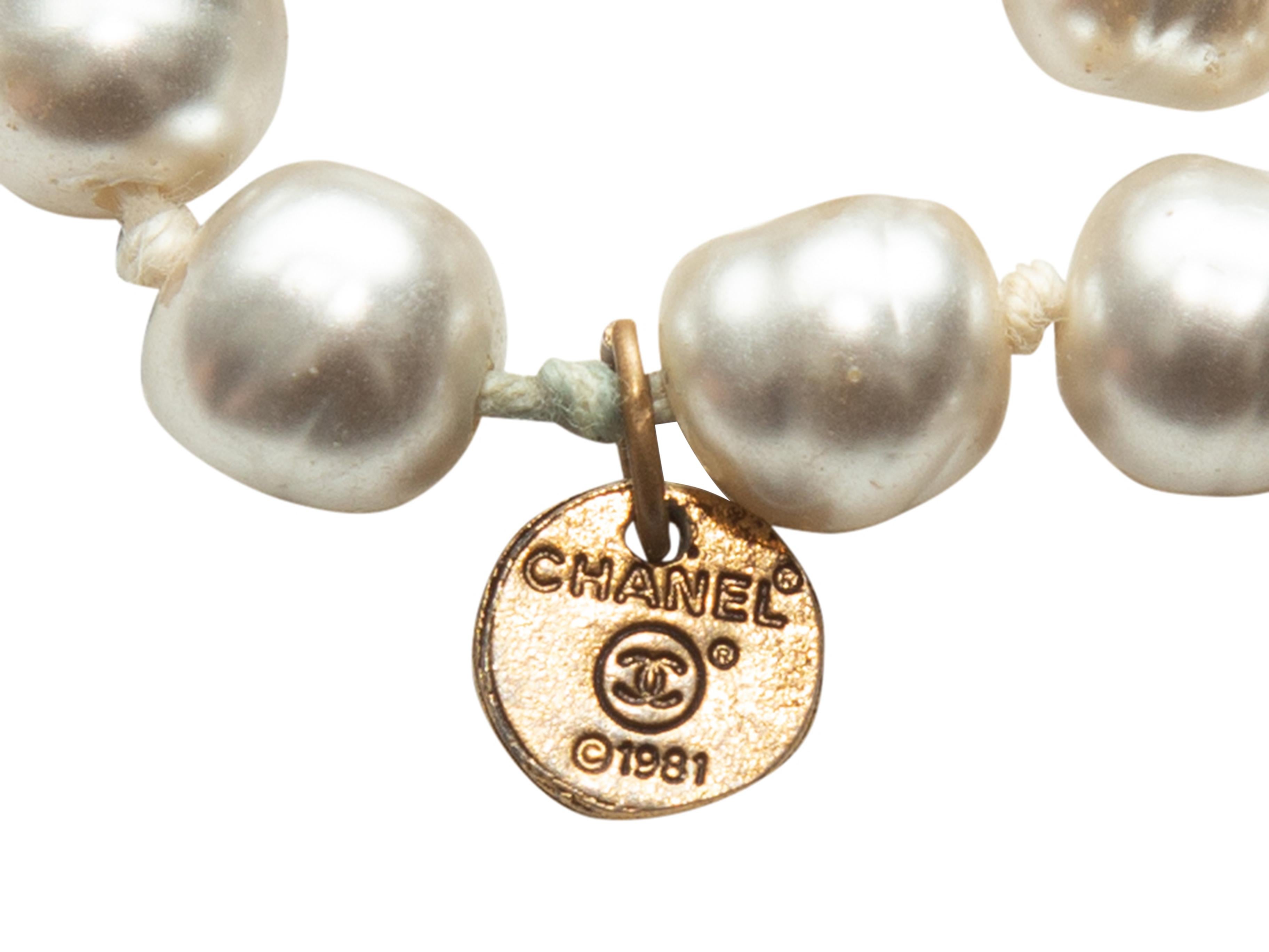 Product details: Vintage white freshwater pearl strand necklace by Chanel. Circa 1981. 70