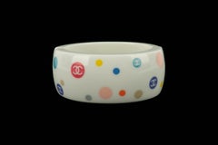 Chanel White Bakelite Cuff Bracelet with Multicolored CC Logos, 2005