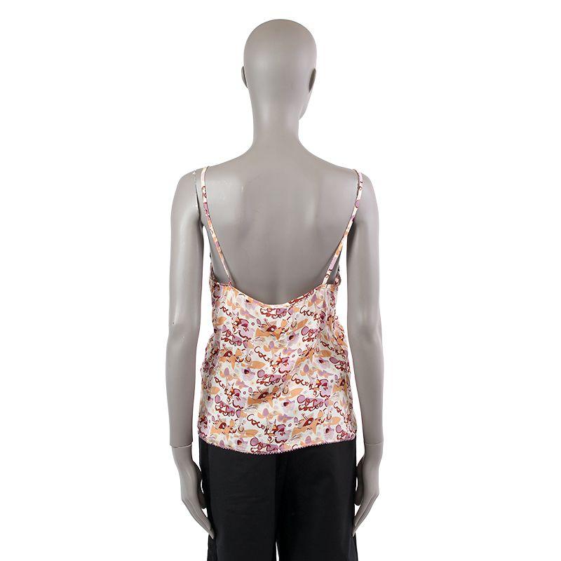 Chanel tank-top in white, light purple and beige silk (with 5% spandex). Has been worn and are in excellent condition.

Tag Size 42
Size L
Bust 86cm (33.5in)
Waist 82cm (32in)
Hips 94cm (36.7in)
Side Seam Length 37cm (14.4in)