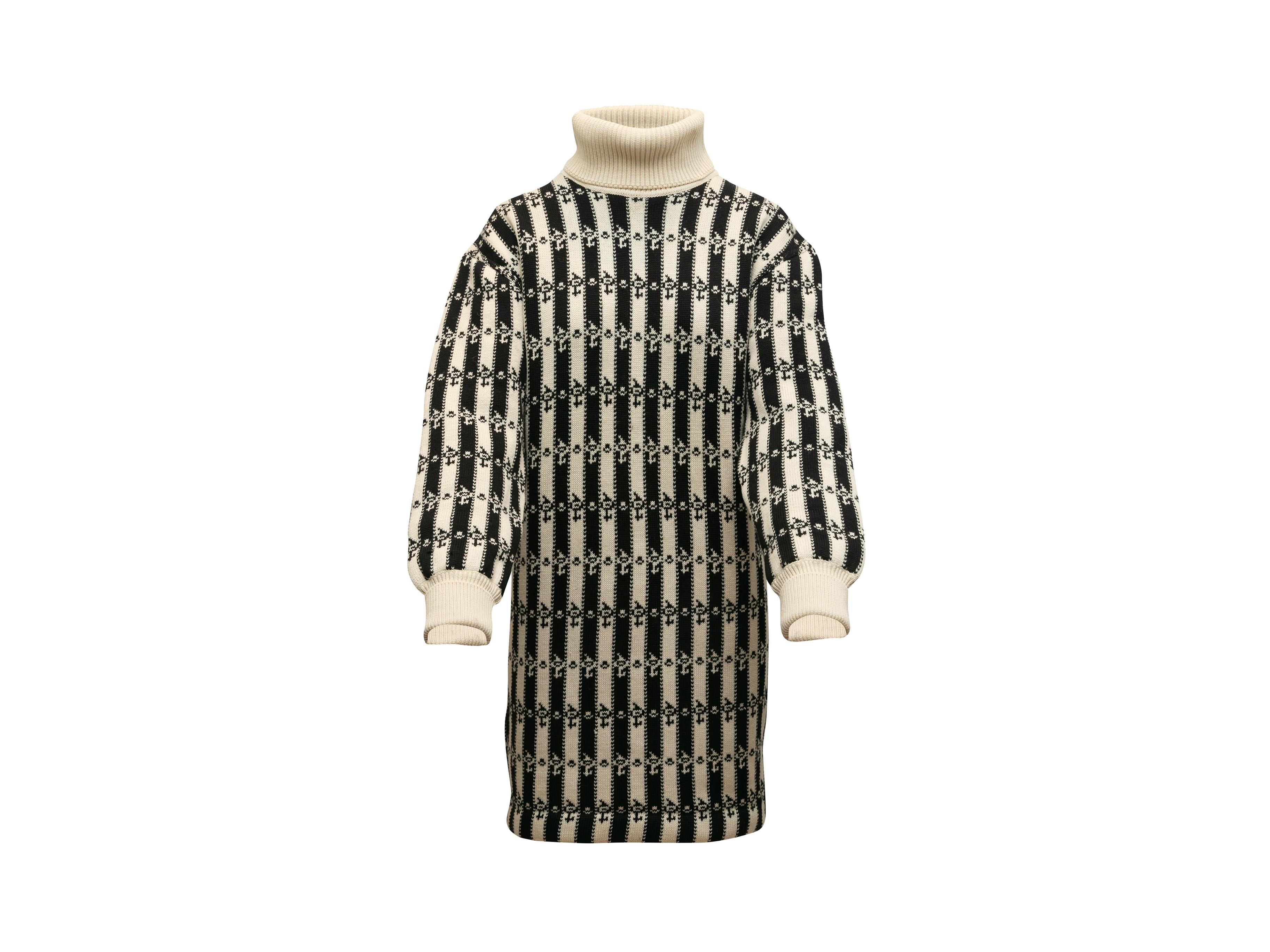 Product details: Vintage white and black merino wool striped sweater dress by Chanel Boutique. Turtleneck. Long sleeves. Designer size 38. 40