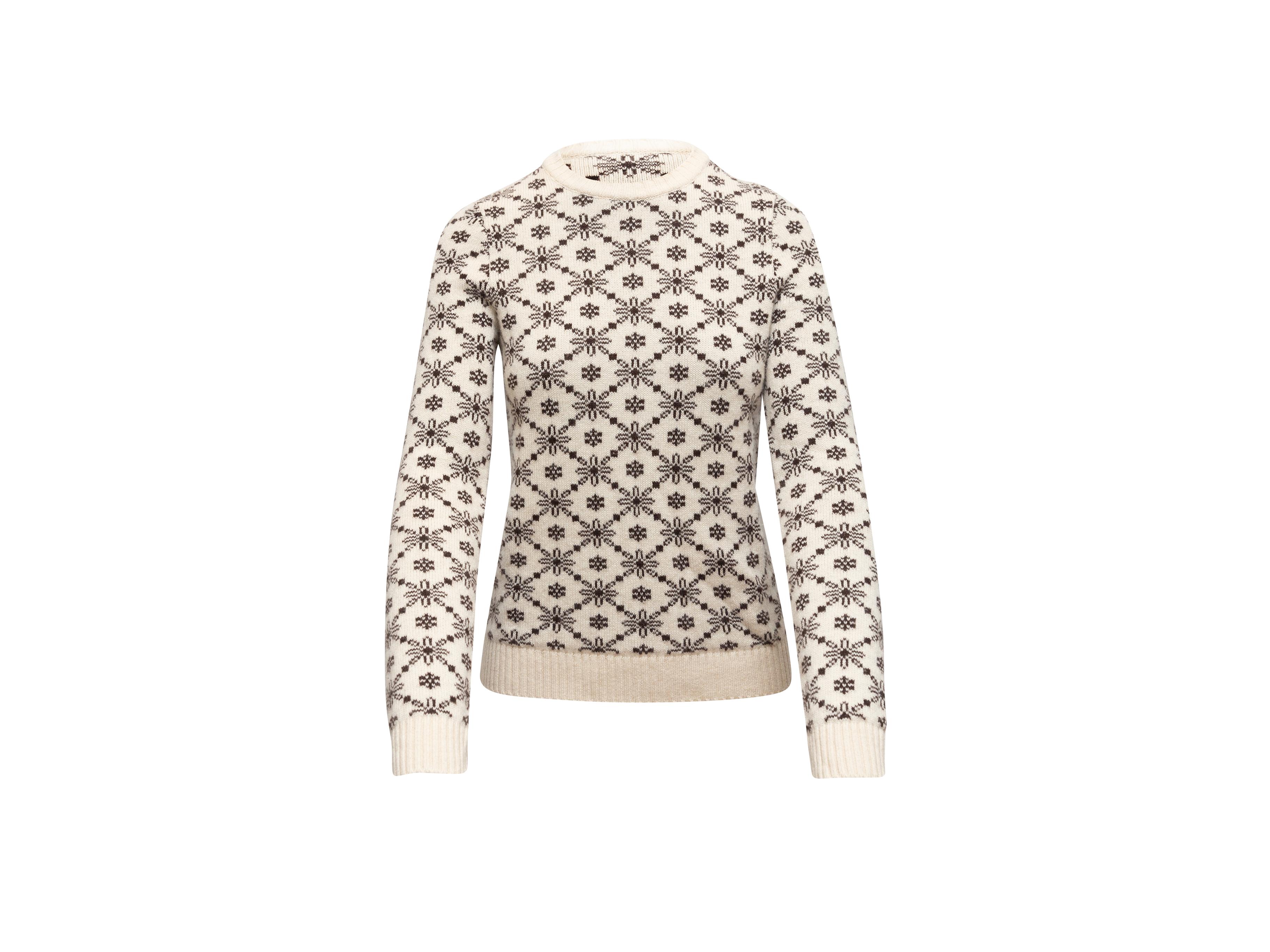 Product details: White and black cashmere snowflake patterned sweater by Chanel. Crew neck. Designer size 38. 32