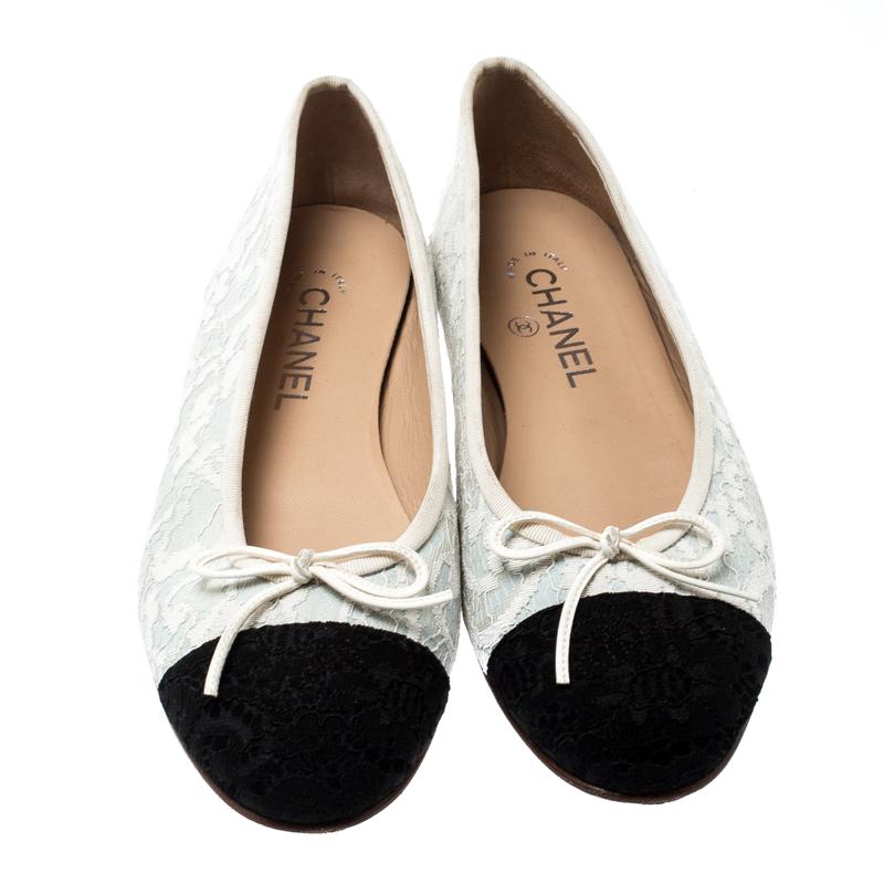 These ballet flats from the house of Chanel are a perfect blend of comfort and style. This gorgeous pair of flats, made of lace with leather trims, would add a classic feminine touch to your look. They come with leather soles, contrasting black cap