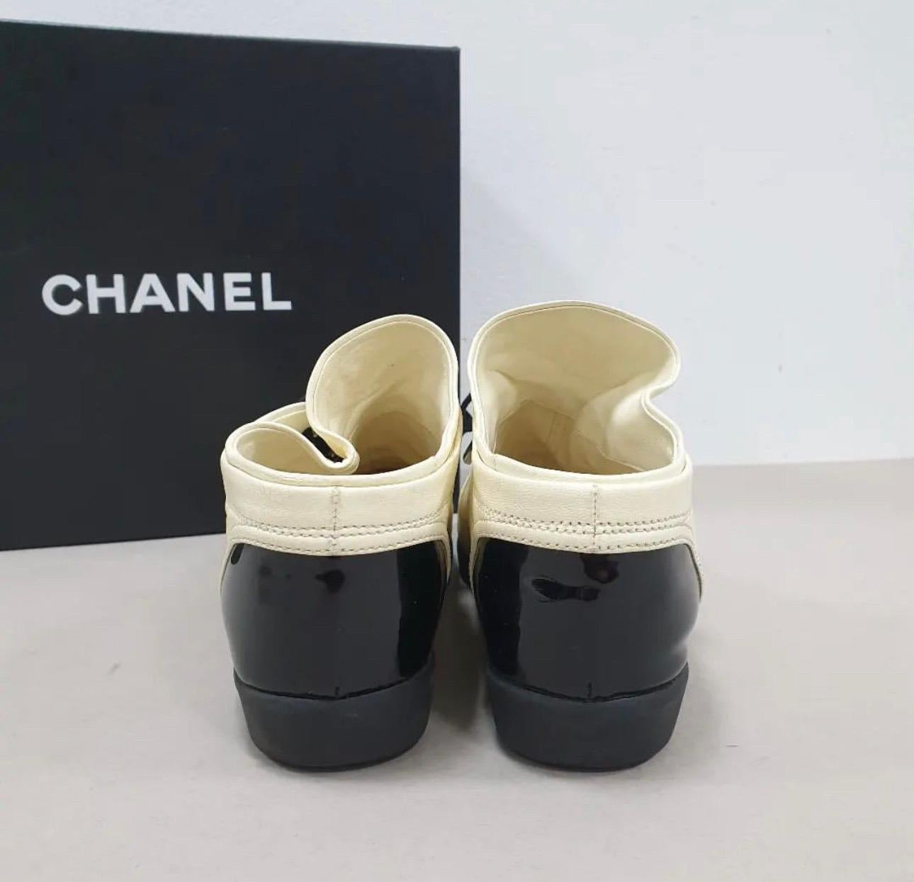 Women's Chanel White Black Patent Leather Captoe CC Logo Sneakers