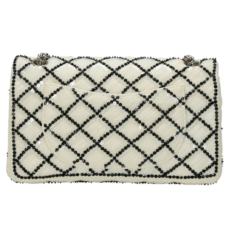An eye-catching, posh and elegant bag coming from Chanel that you’ll love to flaunt at your parties. Crafted from white mesh and adorned with sequins all over the quilted pattern, this bag is a refreshing version of the classic Reissue 2.55 that we